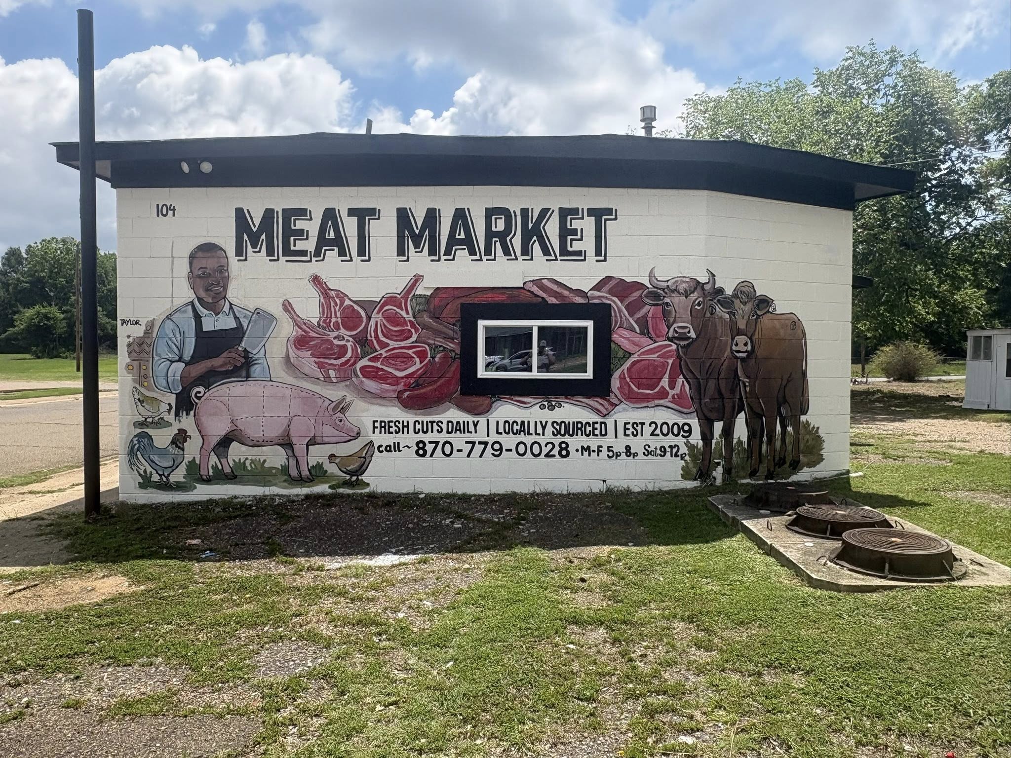 Commercial mural painting — Meat Market building